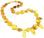 Beads made of figured amber stones